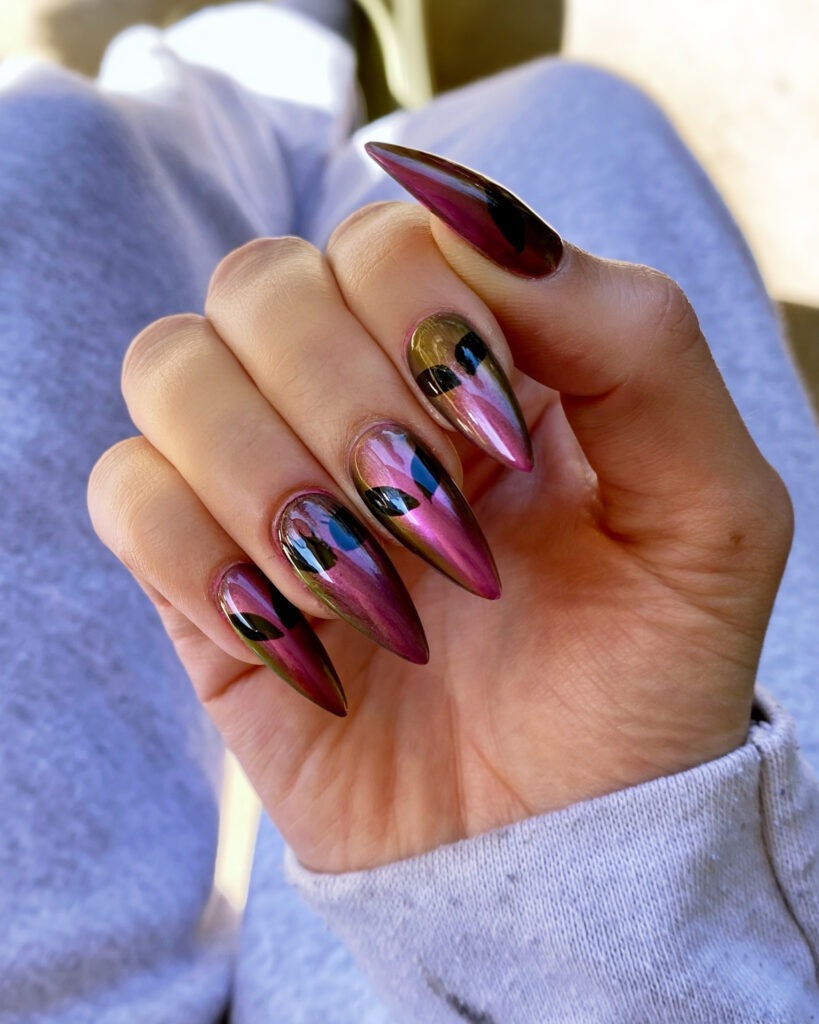 Out of This World: Pink Chrome Alien Stiletto Nails for Halloween