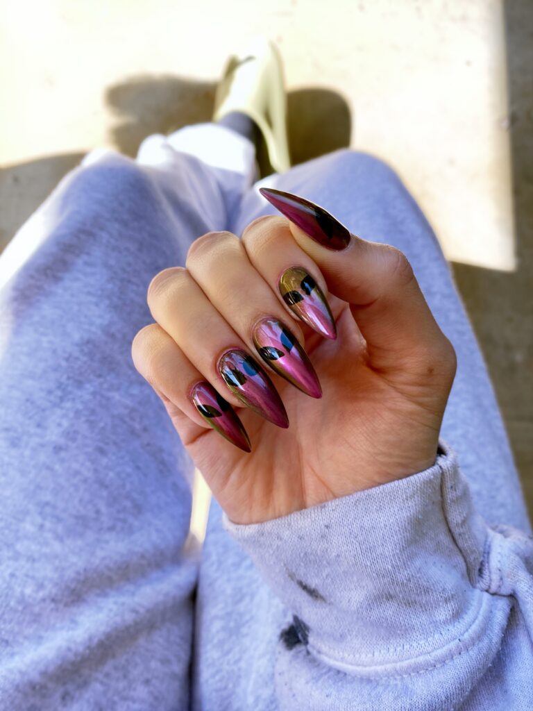 Out of This World: Pink Chrome Alien Stiletto Nails for Halloween