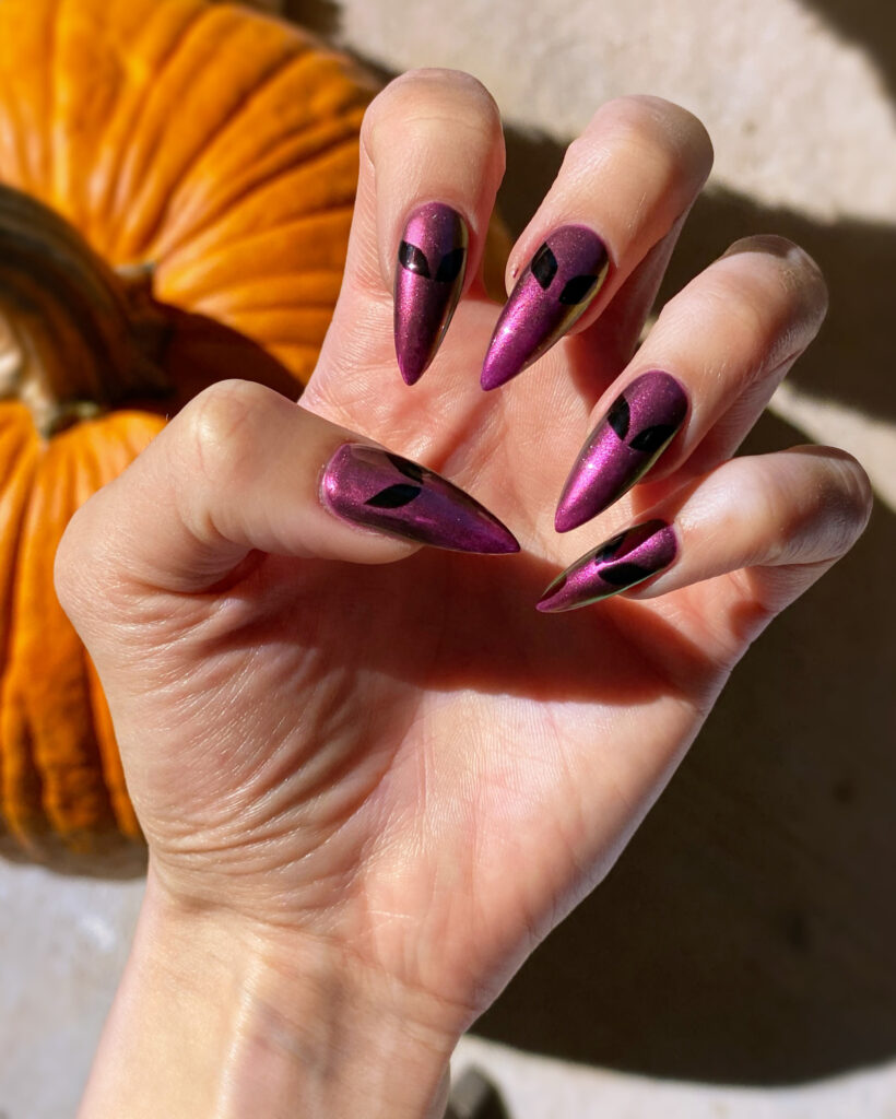 Out of This World: Pink Chrome Alien Stiletto Nails for Halloween